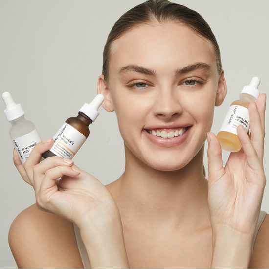 Labothecaire Vitamin C Serum and Hyaluronic Acid Serum and Squalane and Vitamin E Serum with Model